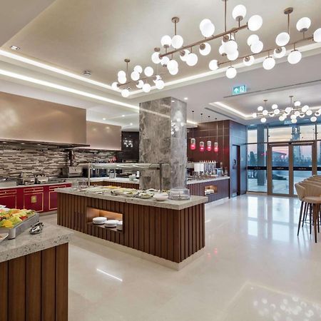 Hotel Doubletree By Hilton Skopje Extérieur photo The Kitchen Table