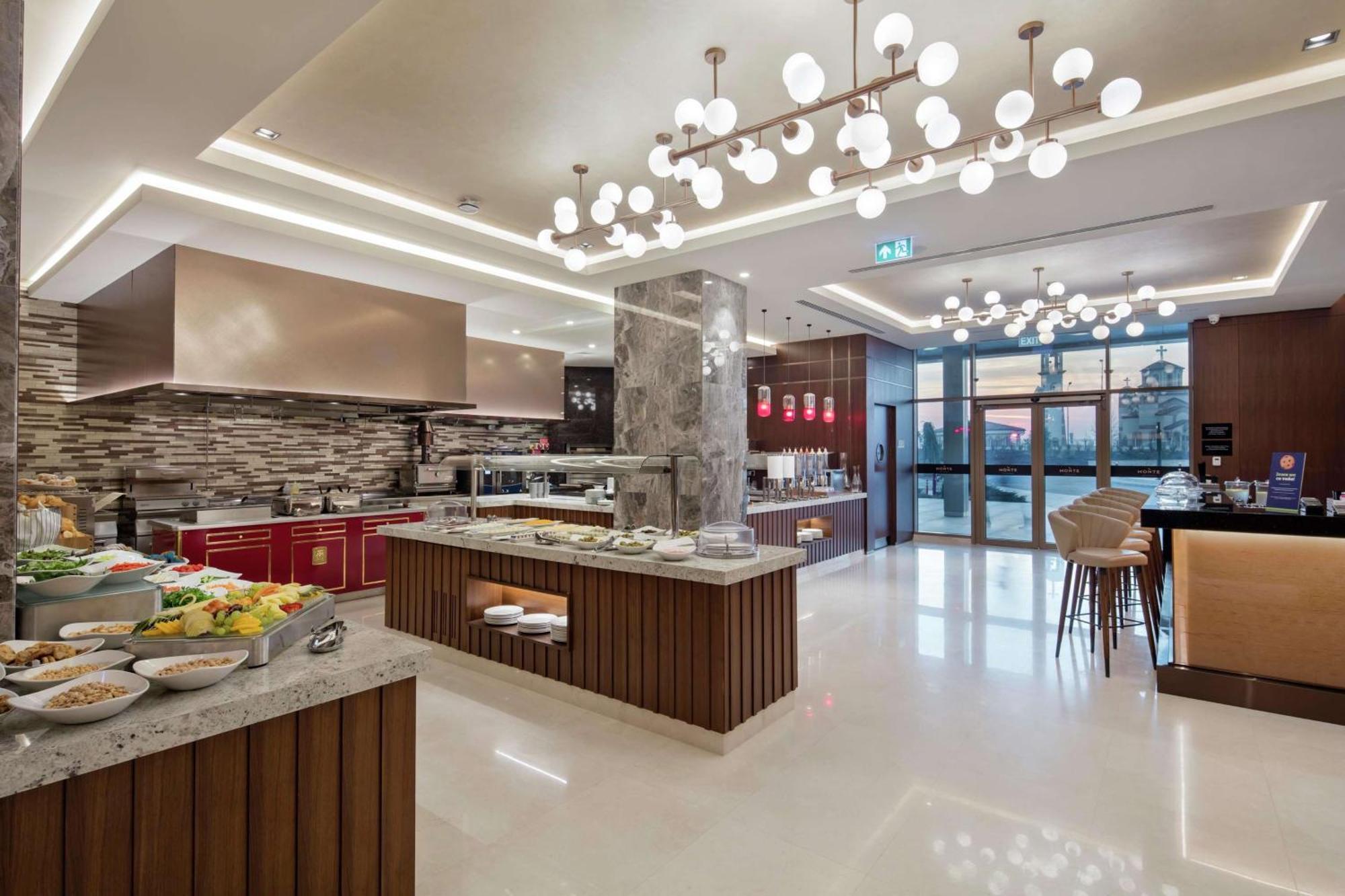 Hotel Doubletree By Hilton Skopje Extérieur photo The Kitchen Table